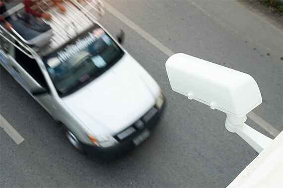 Image of a surveillance camera monitoring traffic.